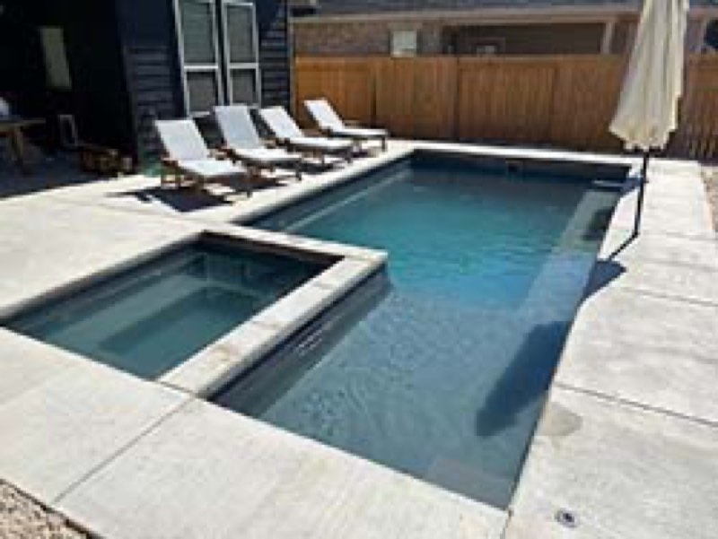 Custom pool built by Hoss Custom Pools - Roanoke Texas